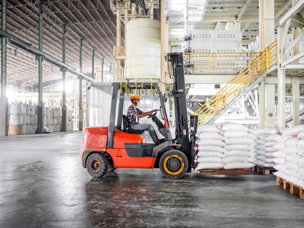 Forklift,Loader,Loading,Pallet,Of,Rice,Bag,Cargo,On,A